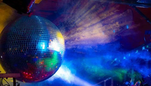 Disco balls on a dance floor were always a common sight at parties.
