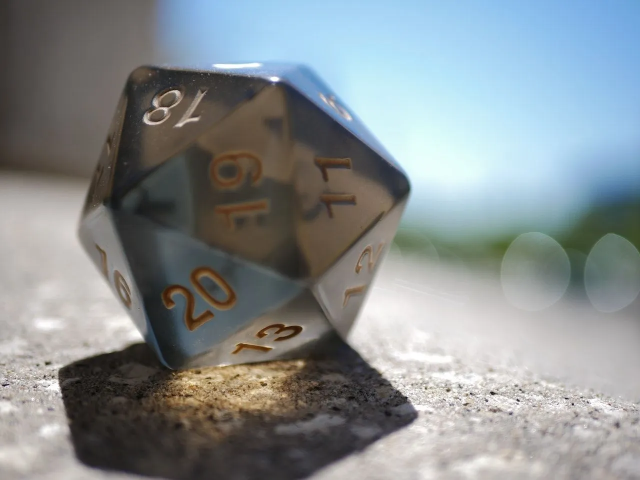 SIlver black d20 dice from Dungeons and dragons