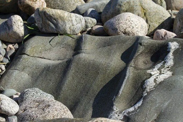 Stone erosion is also caused by the change in wind and water flow.