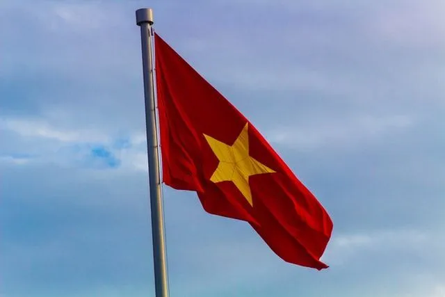 Flag of Vietnam waving in the sky