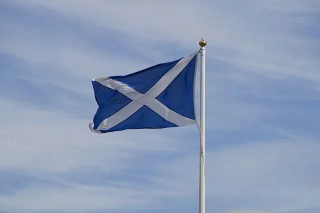 Flag of Scotland waving in the sky