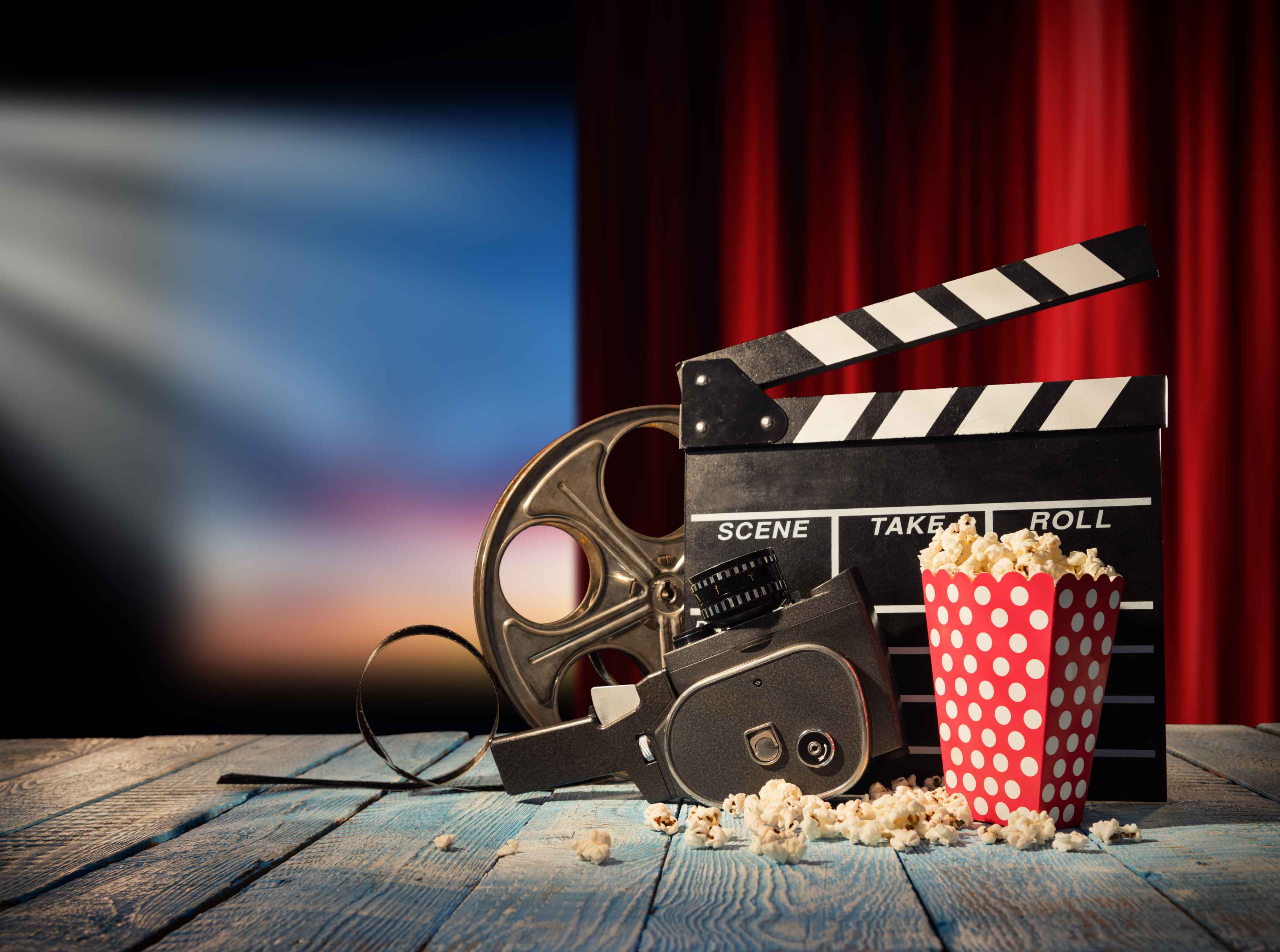 Retro film production accessories placed on wooden planks