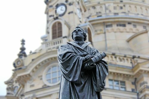 Stone statue of Martin Luther who lived in the medieval times 