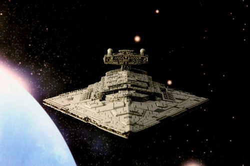 The Millennium Falcon flying through space.