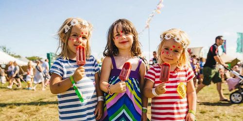 Three little girls at a festival on the weekend.