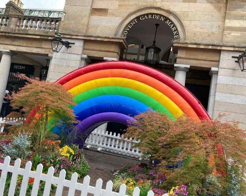 An inflatable rainbow in Covent Garden in London