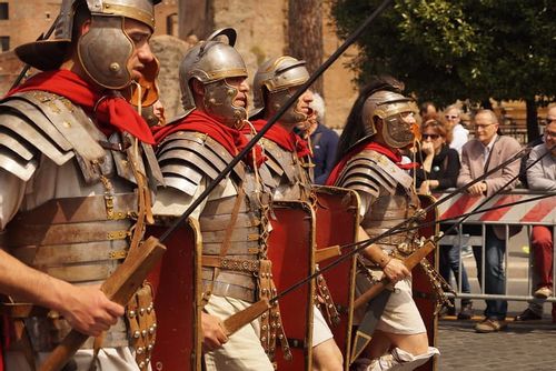 Roman soldiers marching forwards.