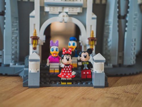 Lego figures of Disney characters Mickey and Minnie Mouse, and Donald and Daisy Duck.