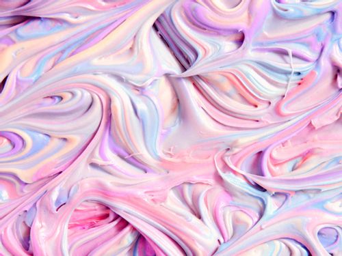 A mix of pastel-coloured icing swirled around.