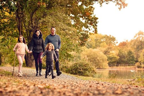 A family on an Autumnal walk during the October half term.