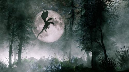 A dragon flying in front of the moon in a dark forest