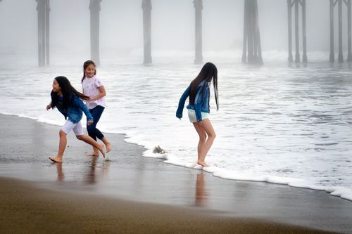 Three girls enjoying on the beach